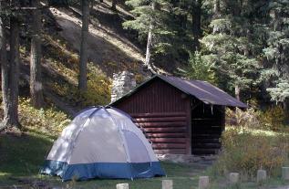 A tent and shelter at the campground
