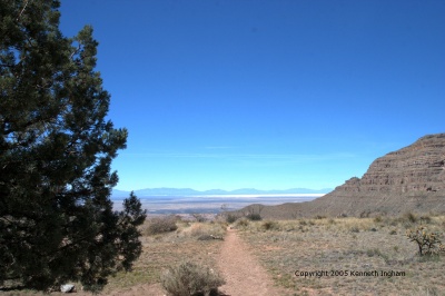 trail on the bench with White Sands and the Tularosa basin
