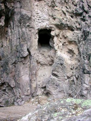 A cave in the canyon wall
