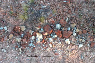 Red and non-red rocks contrasting with each other.
